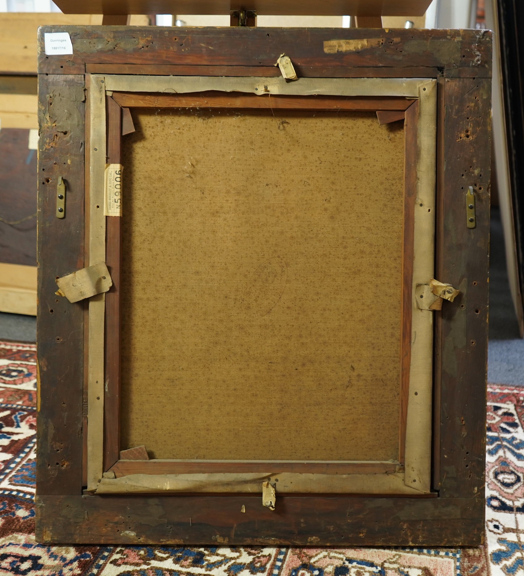 R. G Eves (1876-1941) Half length portrait of a young gentleman, signed upper right James Bourlet & Sons label verso, oil on canvas, 59 x 48cm